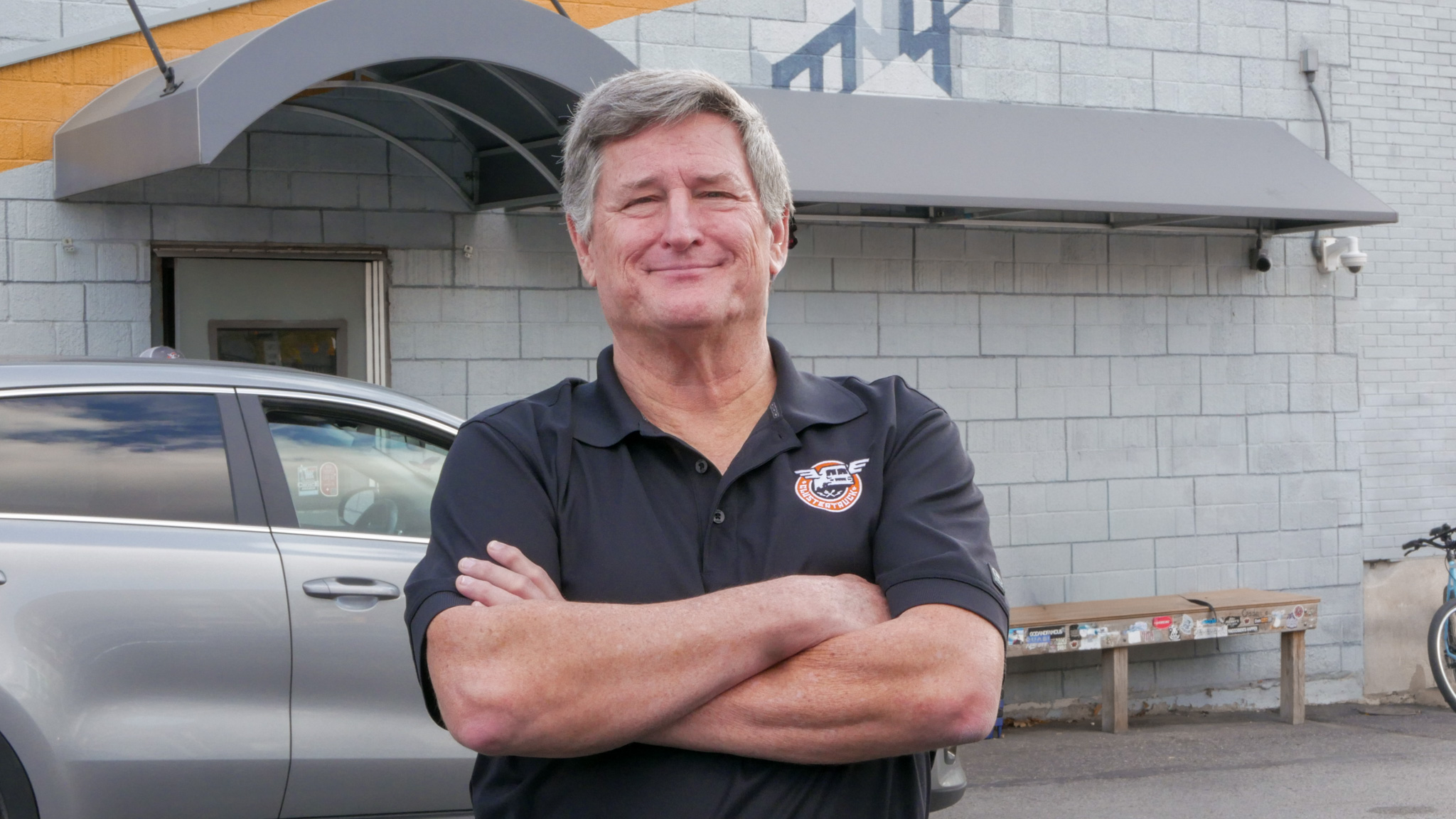 Franchisee, Joe Curtis, posing outside of the Downtown Indy kitchen. 
